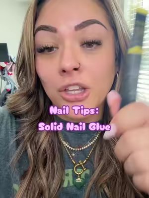 TikTok post by @sarahstar2u for Exsivia. Caption reads: [...] solid nail glue you will never go back....