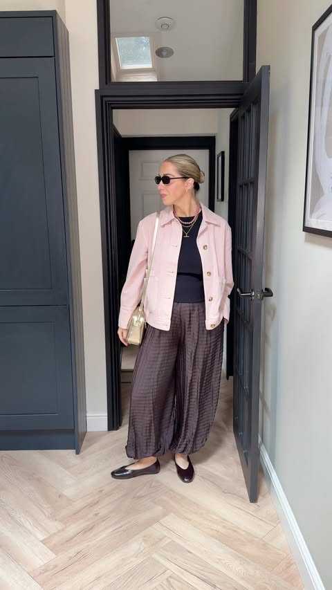 Instagram post by @lyds_wardrobe for Hush. Caption reads: [...] Gold bag* @sofia.and.spritz Pink jacket*....