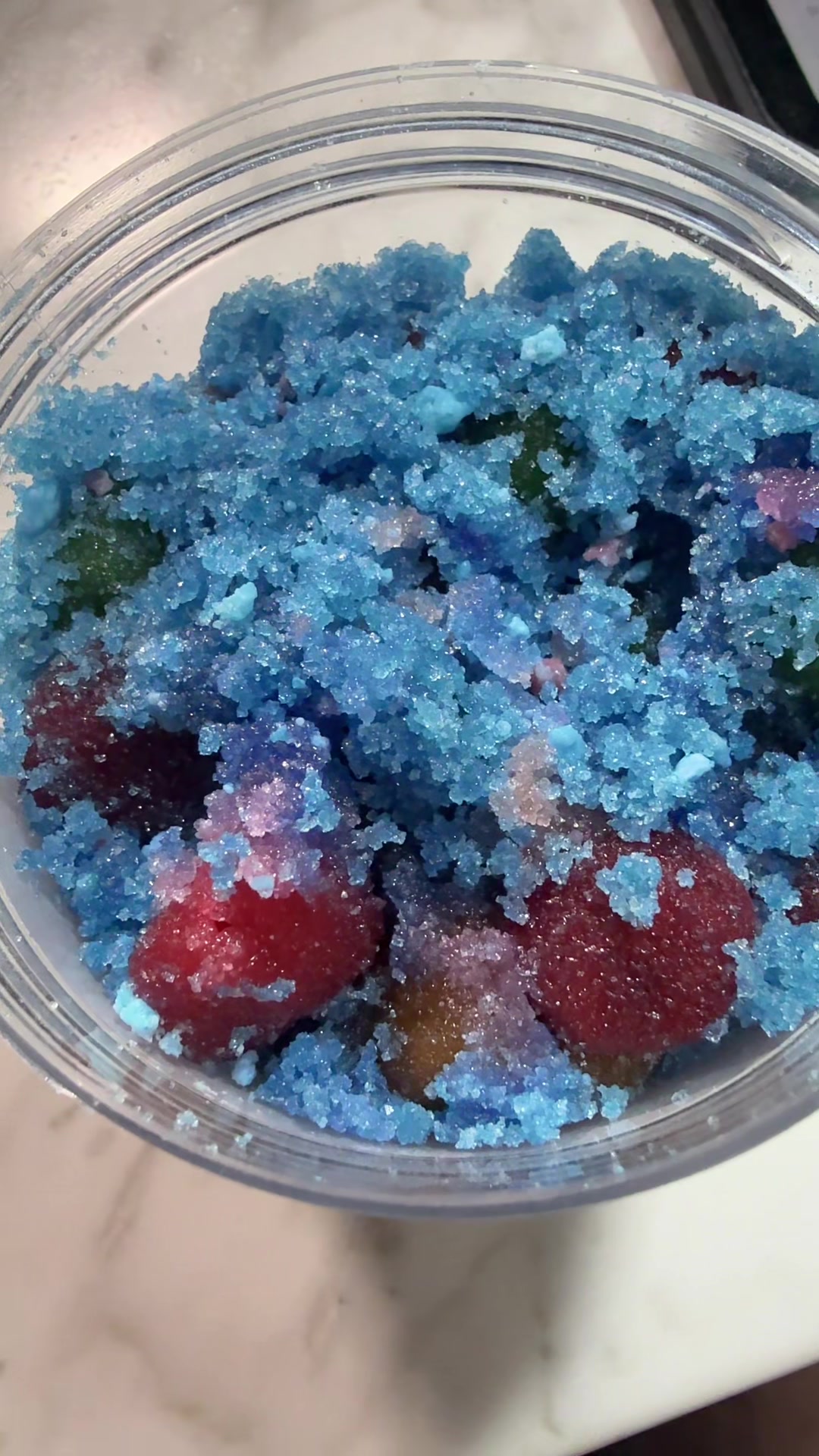 TikTok post by @john_boudreaux for Poppin Crunch. Caption reads: [...] sour blue raspberry gushers from....