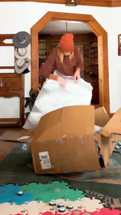 Instagram post by @whataboutbunny for Snoozer Pet Products. Caption reads: The Overstuffed Sofa is plush, springy, and super....