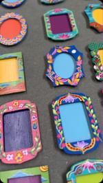 Instagram post by @theyellowbrush.studio for Diageo. Caption reads: We created 32 photo frame magnets for the team of....