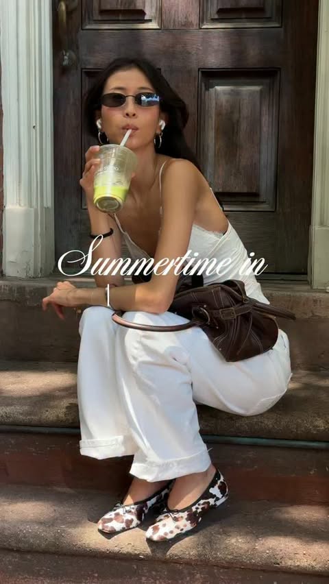 Instagram post by @yuna.lee for Urban Outfitters. Caption reads: #UOPartner NYC Summertime in my @urbanoutfitters....