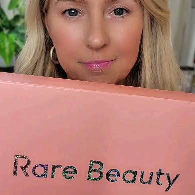 Instagram post by @beautybybev101 for Rare Beauty. Caption reads: 💋 NEW from Rare Beauty: Meet your shimmer era.....