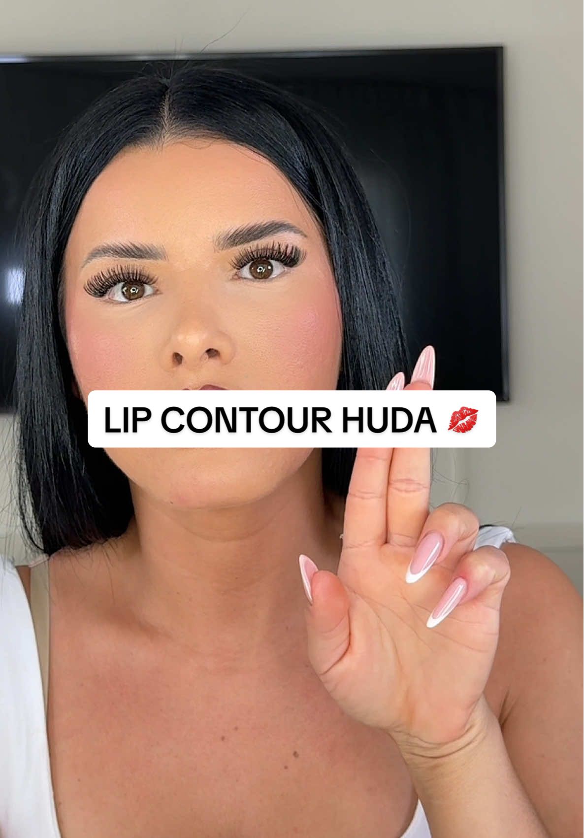 TikTok post by @cilia.ghass for Huda Beauty. Caption reads: [...] Let’s really test that 😏 @Huda Beauty Combo....
