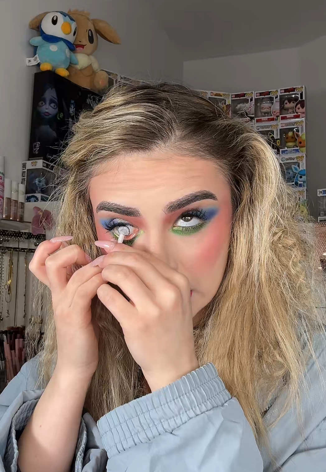 TikTok post by @emilia.poloni for Pixi Beauty. Caption reads: MAKE-UP ANNI 80 (o almeno ci ho provato) using....