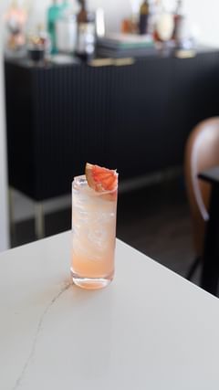 Instagram post by @jaylynn_little for Ritual Zero Proof. Caption reads: A Paloma is one of my favorite winter citrus....