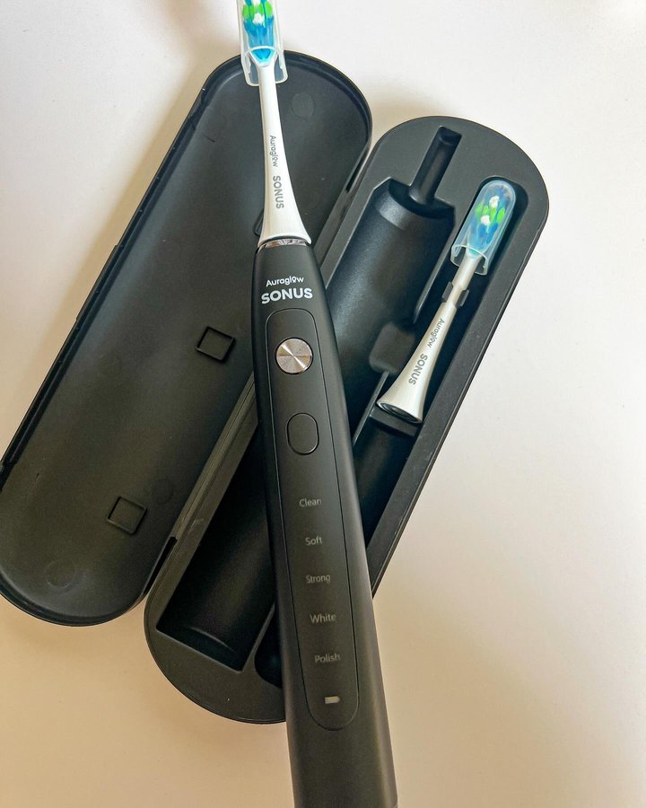 Instagram post by @reviewinh1.3.6.9 for AURAGLOW. Caption reads: [...] a travel case and is IPX 7 waterproof.....