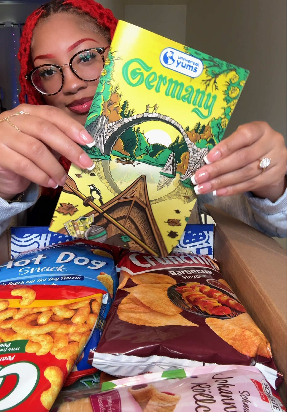 TikTok post by @kie_eats for Universal Yums. Caption reads: @Universal Yums Snack Box Featuring Germany 🇩🇪 &....