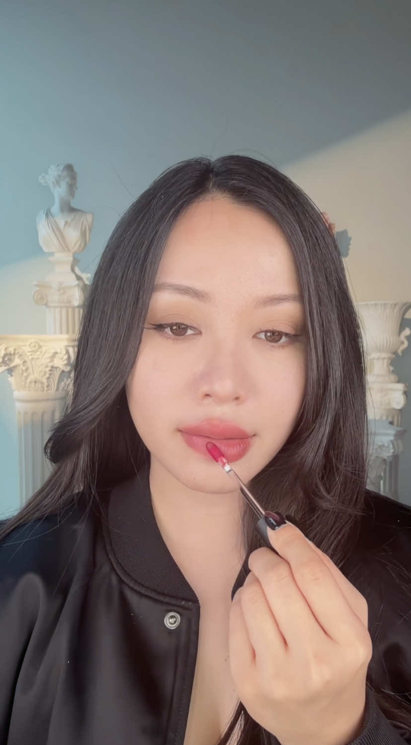 TikTok post by @themichellephan for EM Cosmetics. Caption reads: [...] mood, And yes… it survives eating! @EM....