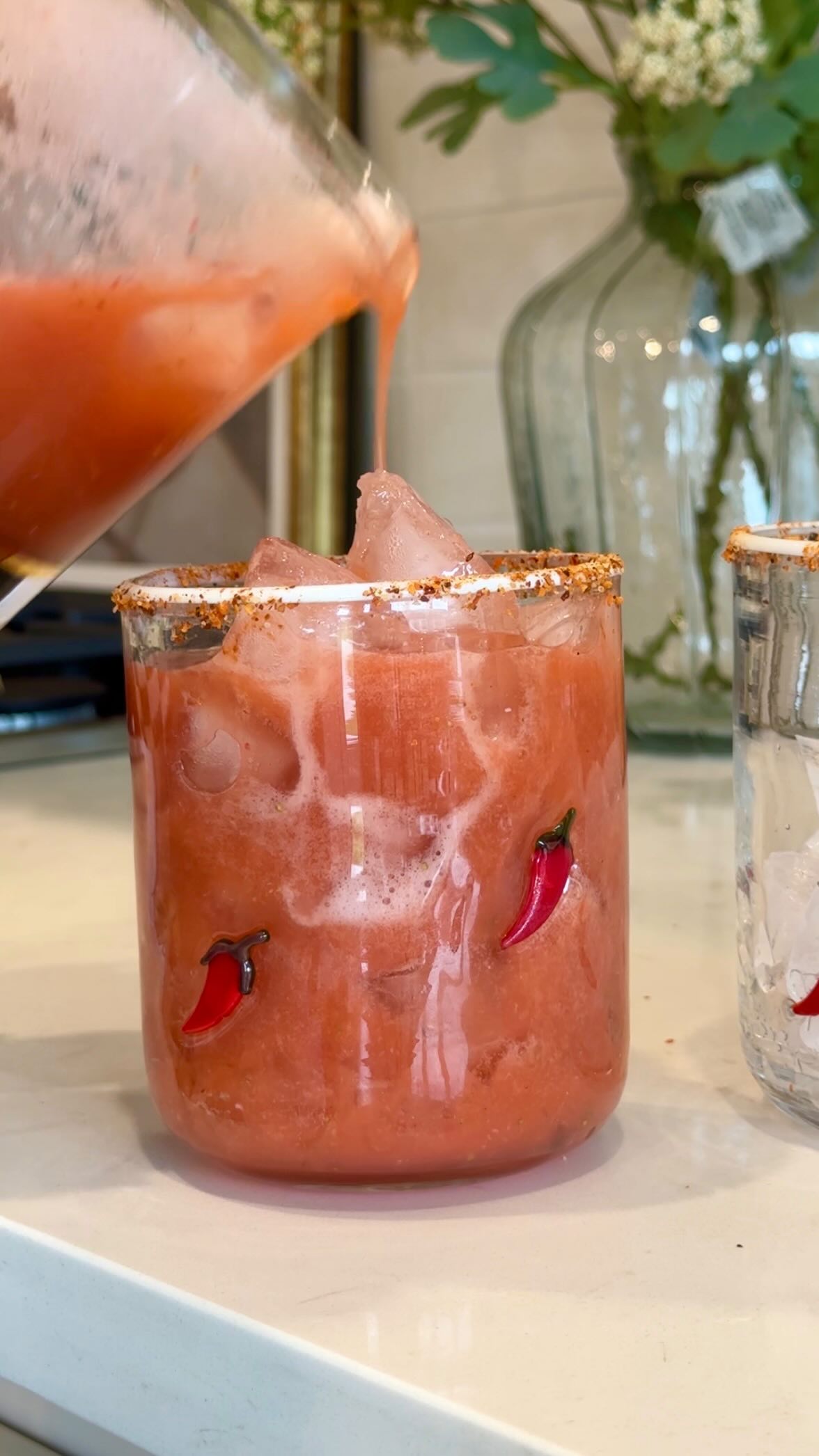 Instagram post by @malloryhudsonxo for 21Seeds Infused Tequila. Caption reads: A quick and easy batch cocktail perfect for....