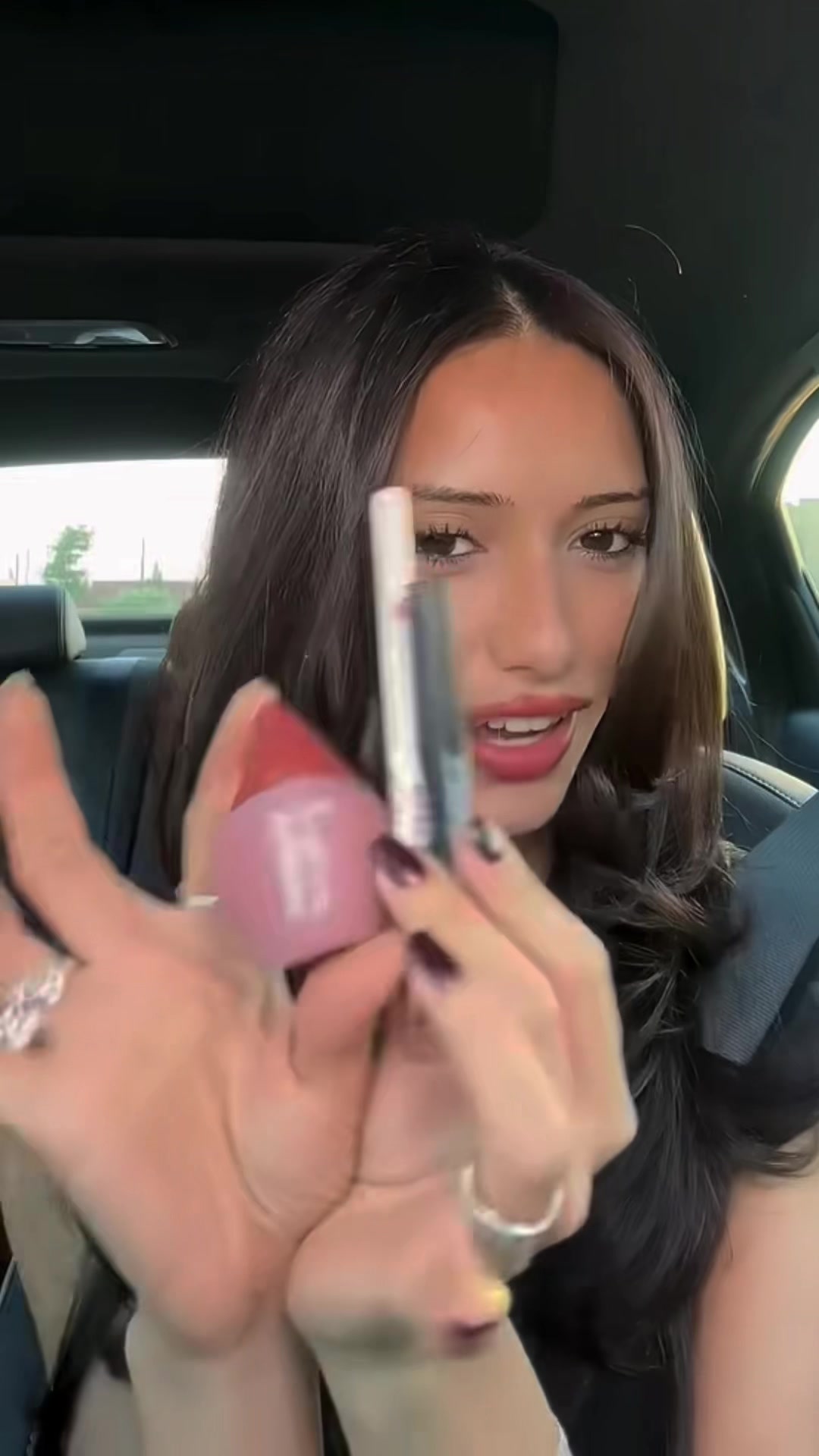 TikTok post by @skunkbabe for Freck Beauty. Caption reads: pomegranate makeup using @Freck Beauty....