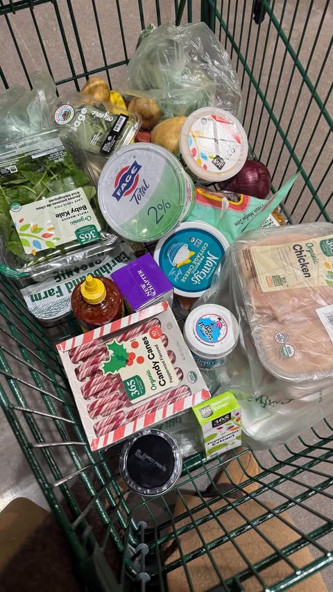 Instagram post by @ellie_teale for Whole Foods Market. Caption reads: Vlogmas day 9 ❄️ grocery shopping at @wholefoods....