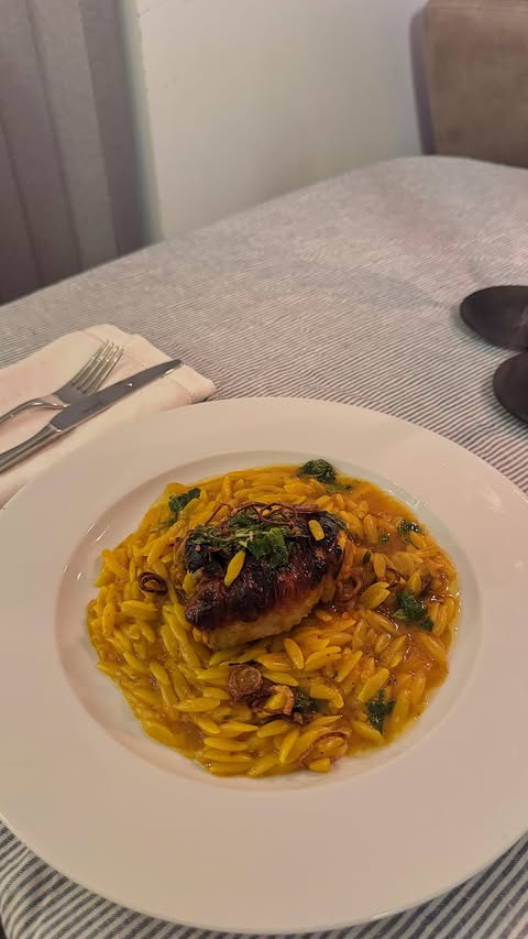 Instagram post by @themondaypastaclub for Ocado. Caption reads: Orange and Honey Chicken Thighs with Saffron Orzo,....