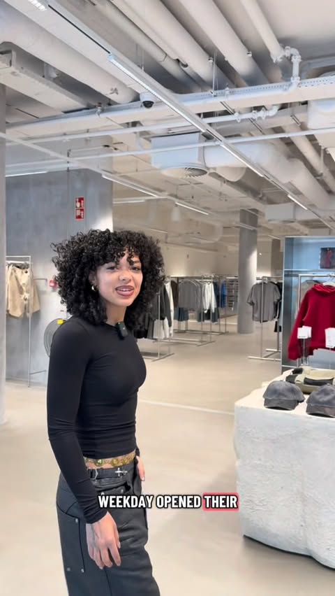 Instagram post by @cherasyy for WEEKDAY. Caption reads: [...] open in rotterdam! you can shop, monki,....