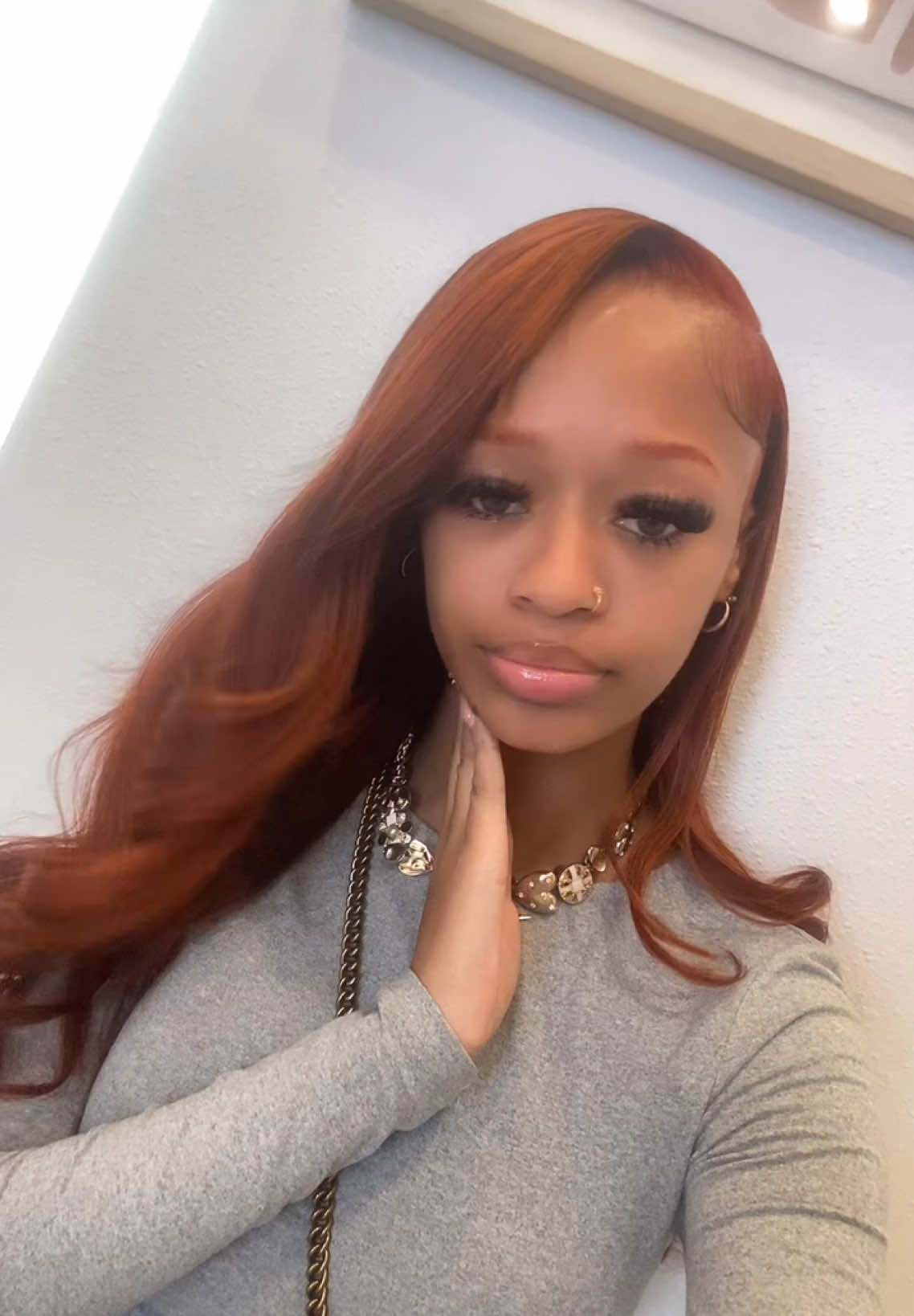 TikTok post by @thegirlwiththecateyes for OkayLove Lashes. Caption reads: my hairstylist never disappoints! @Kyla Williams....