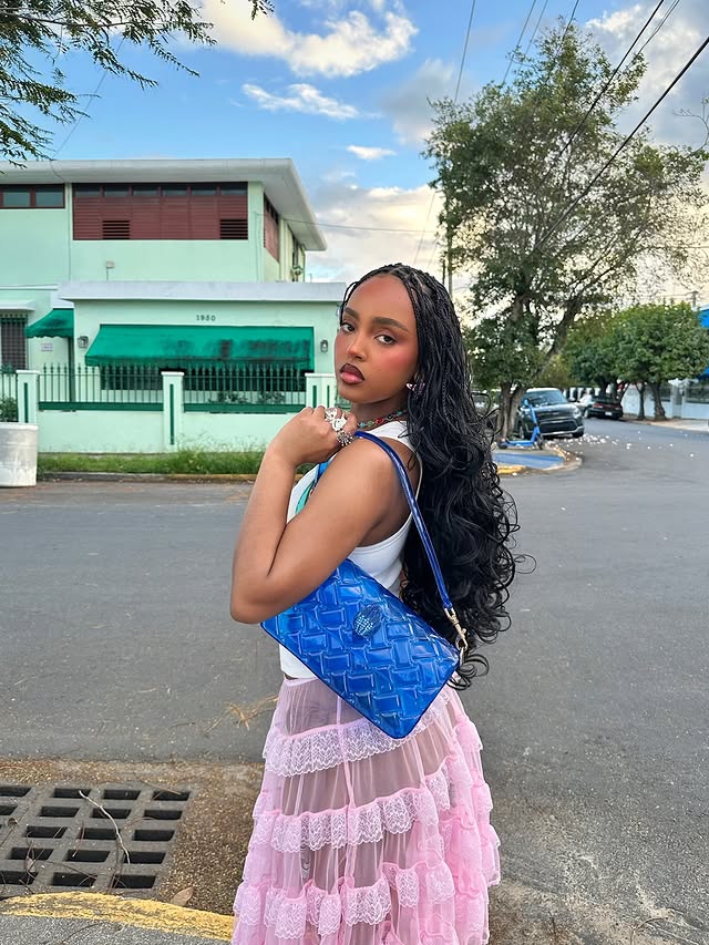 Instagram post by @im_blacklily for Kurt Geiger. Caption reads: obsessed with everything jelly @kurtgeiger....