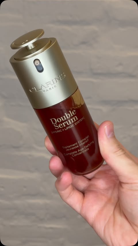 Instagram post by @dermangelo for Clarins. Caption reads: Can you say “ICONIQUE”? #ClarinsPartner....