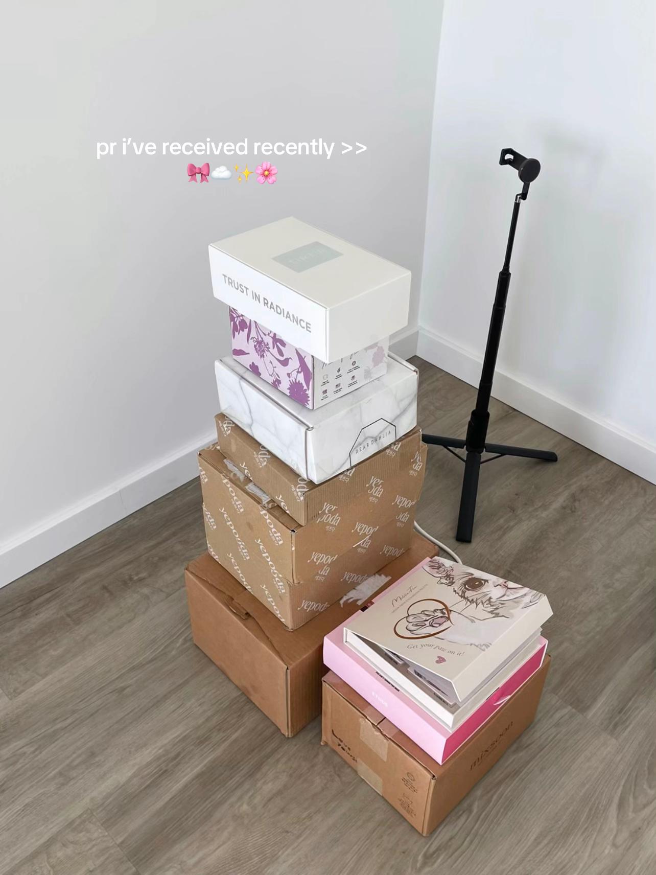 TikTok post by @alicia_ugc for DearDahlia. Caption reads: pr packages i’ve received recently🎀 I’m so....