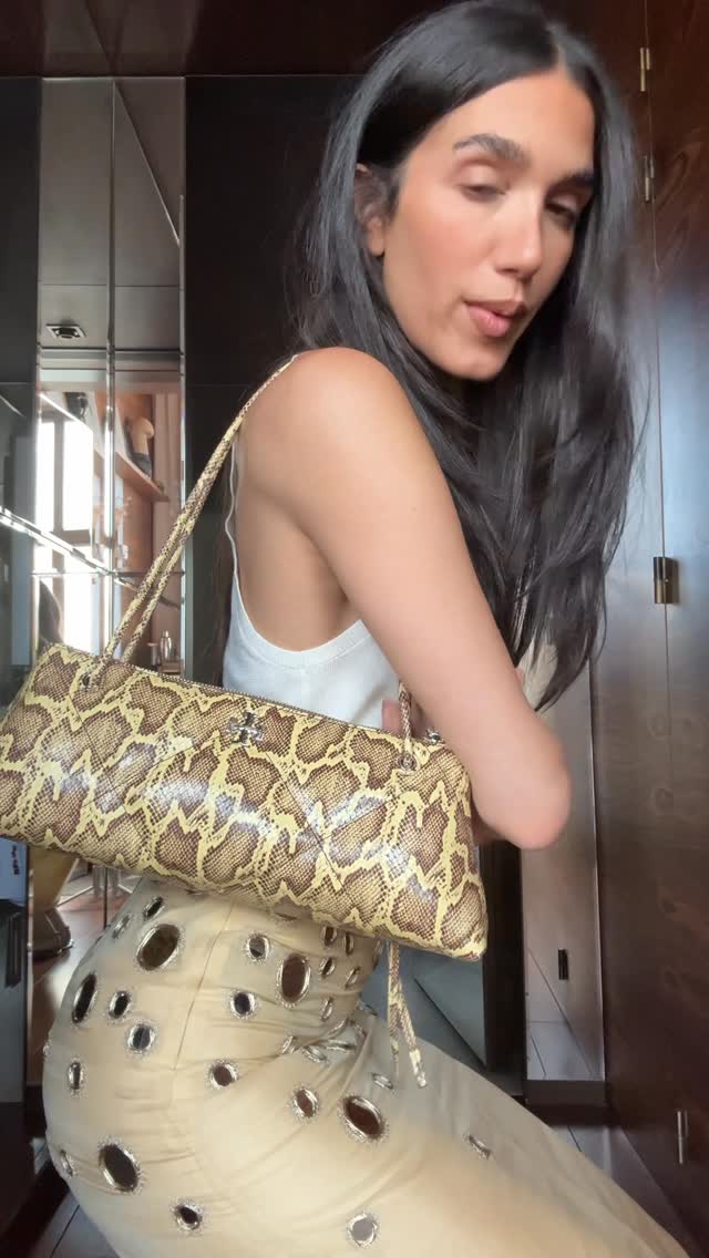 Instagram post by @robrahmand for FARFETCH. Caption reads: It’s like picking your favorite child @farfetch....