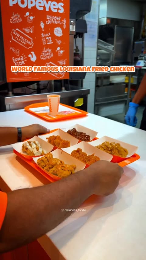 Instagram post by @anees_foodie for Popeyes. Caption reads: 24 pieces of @popeeys_india flavorful fried....