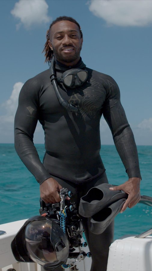 Instagram post by @andremusgrove for Nautica. Caption reads: Happy Earth Month, from the ocean to you. As an....