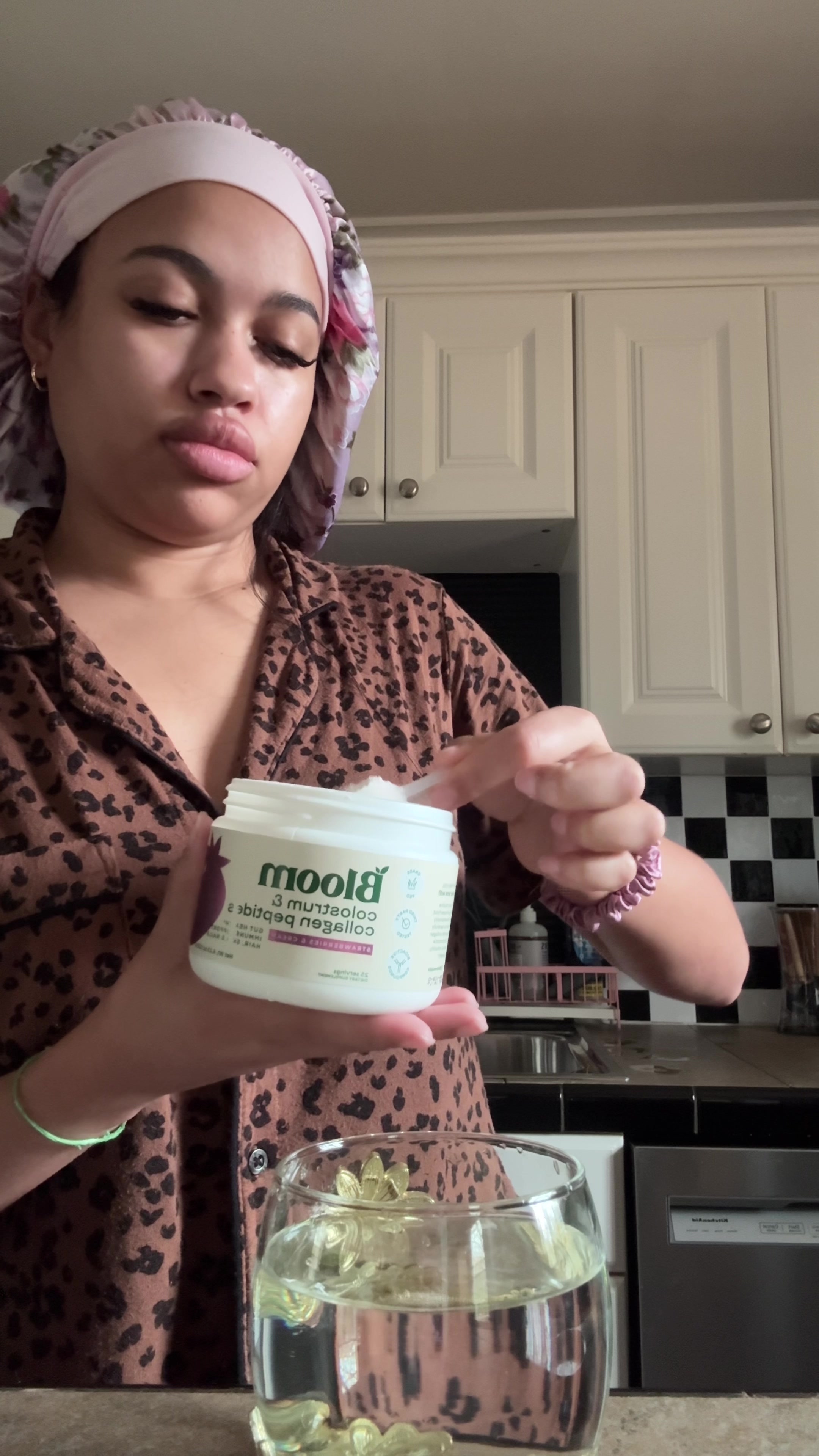 TikTok post by @zizzysizzle for Bloom Nutrition. Caption reads: So happy to be back! 🤭 @Bloom Nutrition....