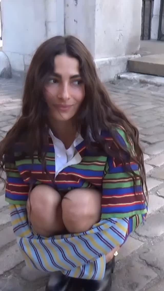 Instagram post by @skyeajones for STAUD. Caption reads: summer w @staud.clothing 🌸🌈🌞.