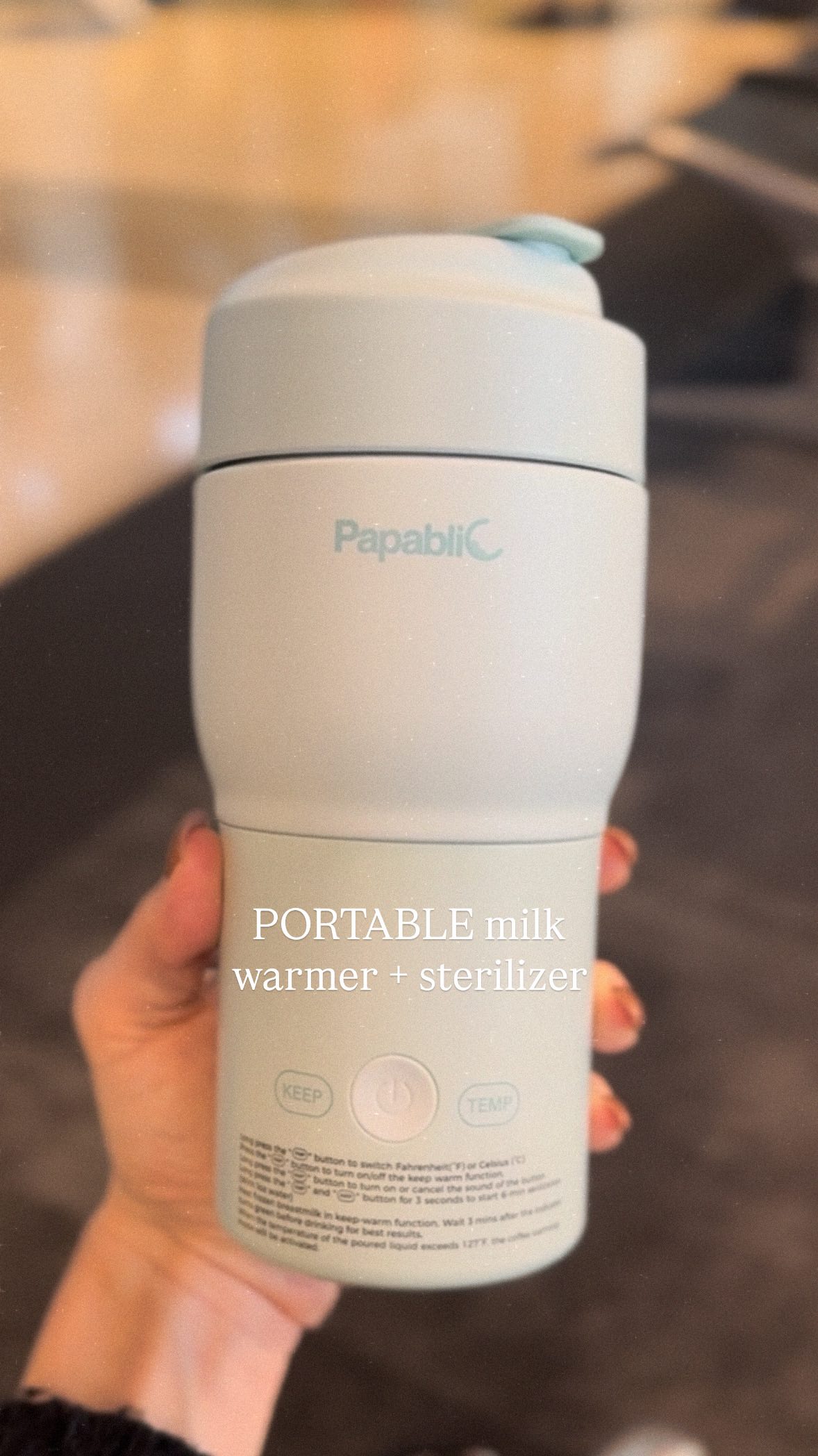 Instagram post by @trippingmillennial for Papablic. Caption reads: Link in bio for portable milk warmer + sterilizer....