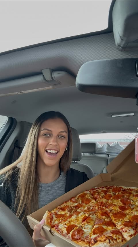 Instagram post by @gabbie.marshall for Casey’s. Caption reads: [...] code PIZZAWEEK when you order in the Casey’s....