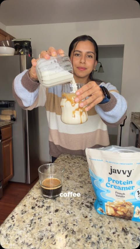 Instagram post by @elizalozano.creator for Javvy Coffee. Caption reads: [...] French Vanilla Protein Creamer from....