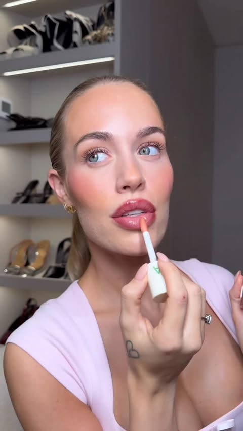 Instagram post by @lottietomlinson for Adored By. Caption reads: I’m so excited to be teaming up with @adoredbyuk....