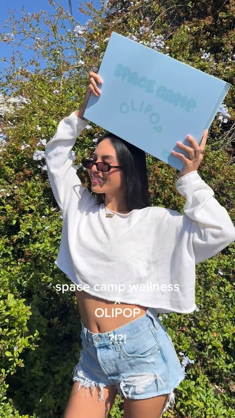 Instagram post by @jayka.noelle for OLIPOP. Caption reads: [...] in @target! @spacecampwellness x....