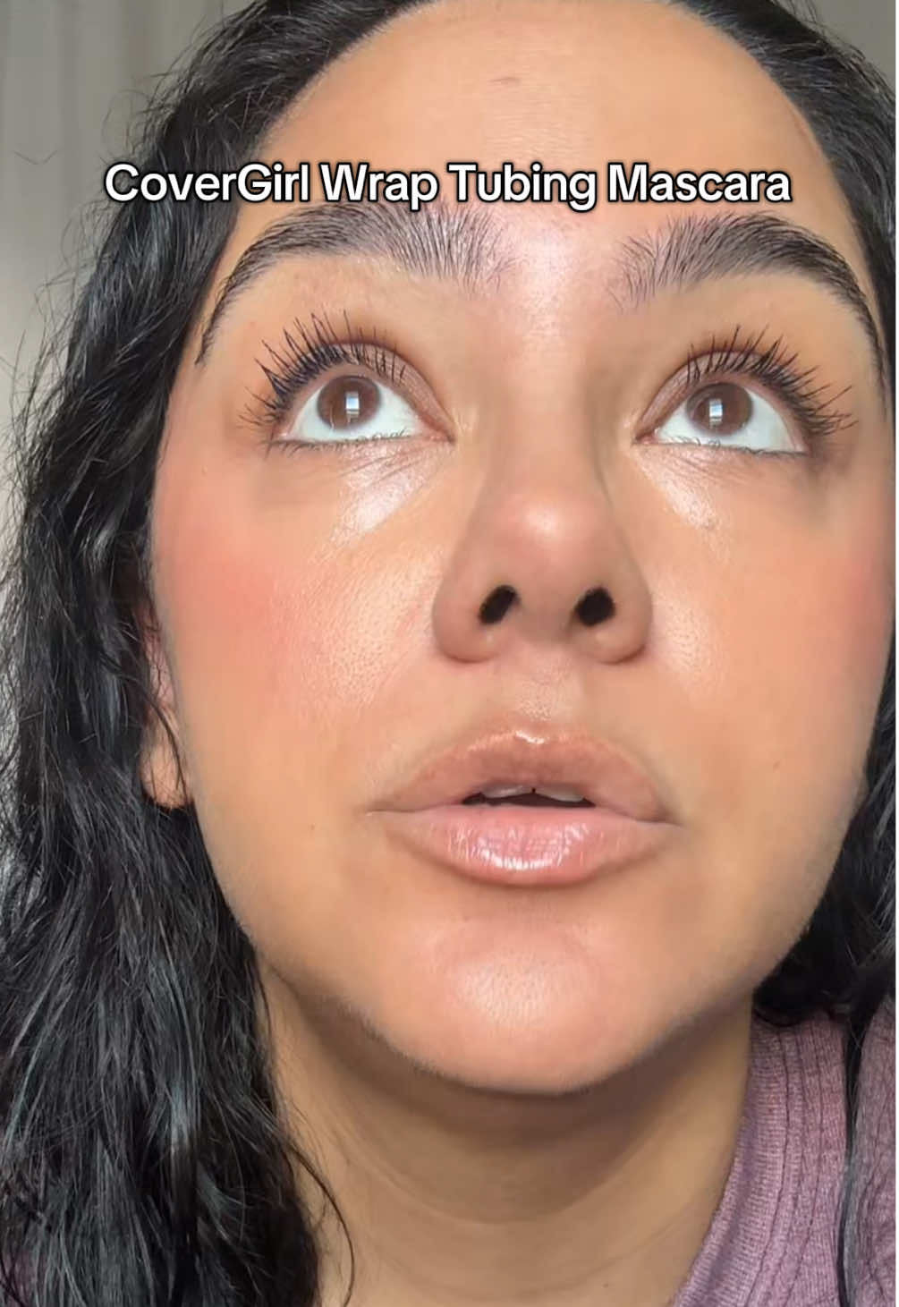 TikTok post by @thenotarichgirl for COVERGIRL. Caption reads: CoverGirl Wrap Tubing Mascara [...].