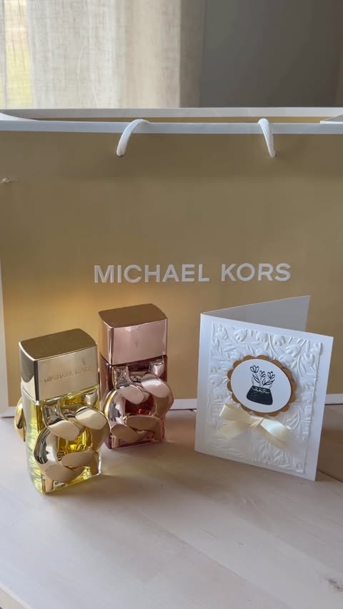 Instagram post by @kaylenfaye_ for Michael Kors. Caption reads: [...] Day card and gift idea 🥹 #ad #michaelkors....