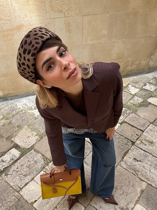 Instagram post by an influencer for TWO WAY. Caption reads: Cucù 🦉 Having fun with my new TW look 🫶🏼 AD.
