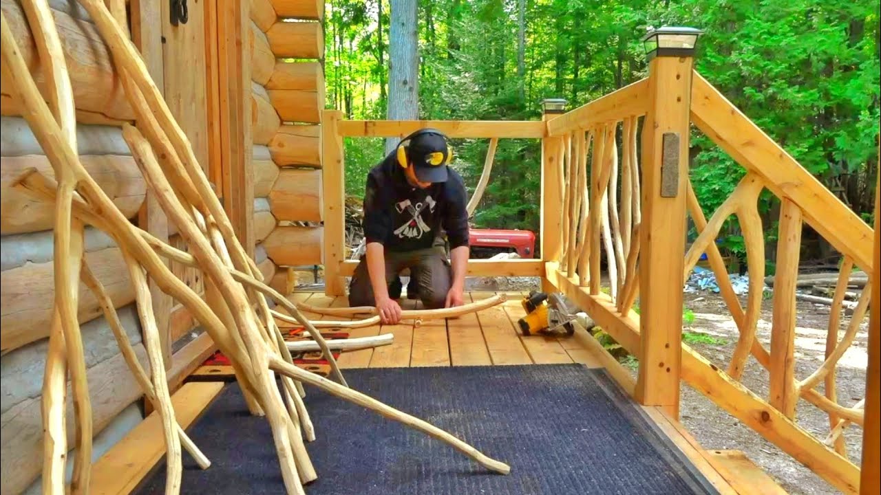 YouTube post by @TheOutsiderCabin for Bespoke Post. Caption reads: Rustic Porch Build! Stone Inlays & Twig Railings /....