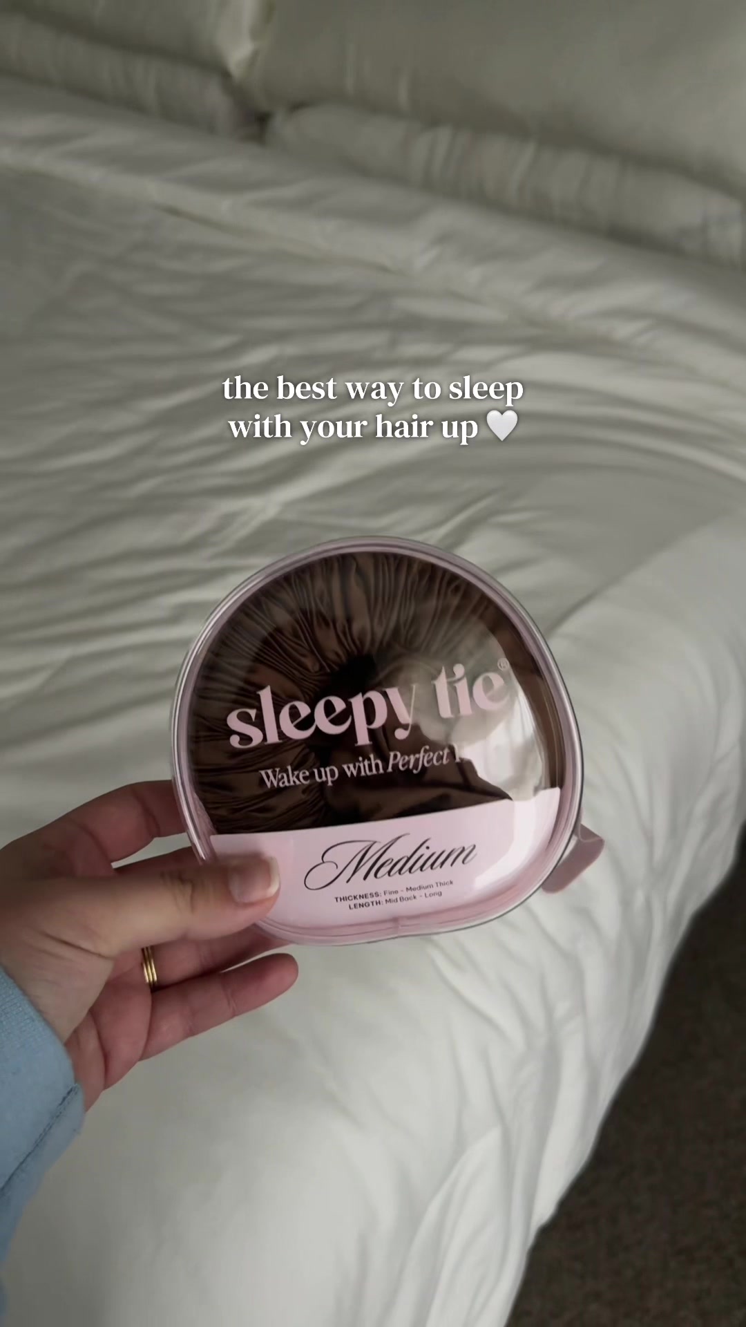 TikTok post by @foxandluxe for Sleepy Tie. Caption reads: [...] secret to waking up with a blowout 🤍....