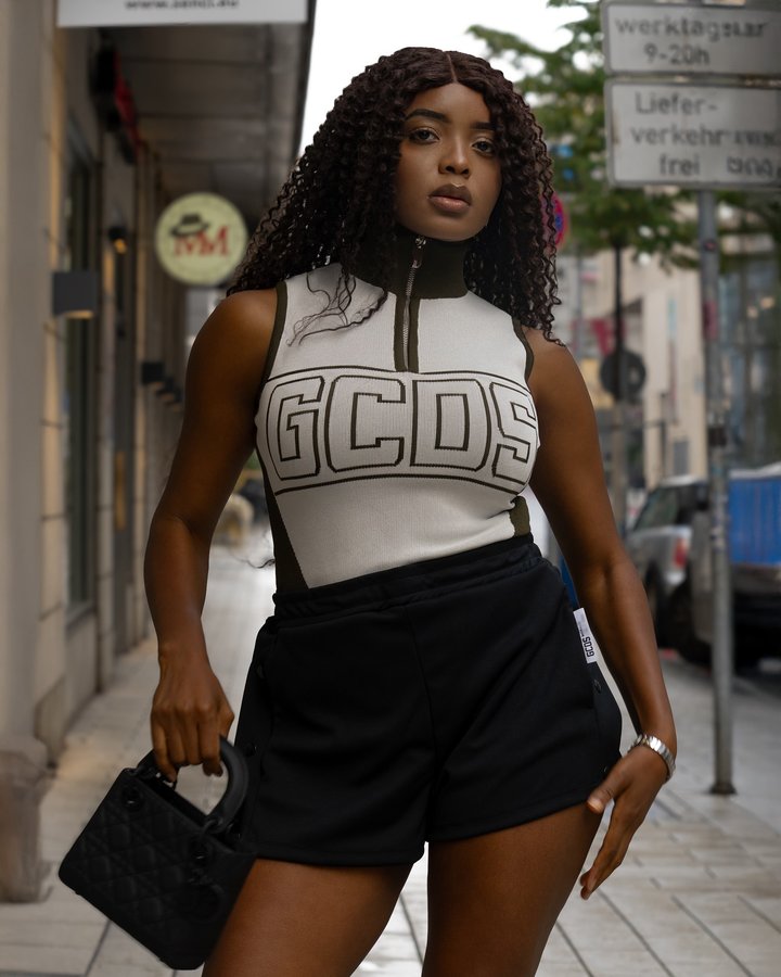 Instagram post by @dizeudaniele for GCDS. Caption reads: Anzeige// Some girls get moody, I get @gcdswear.