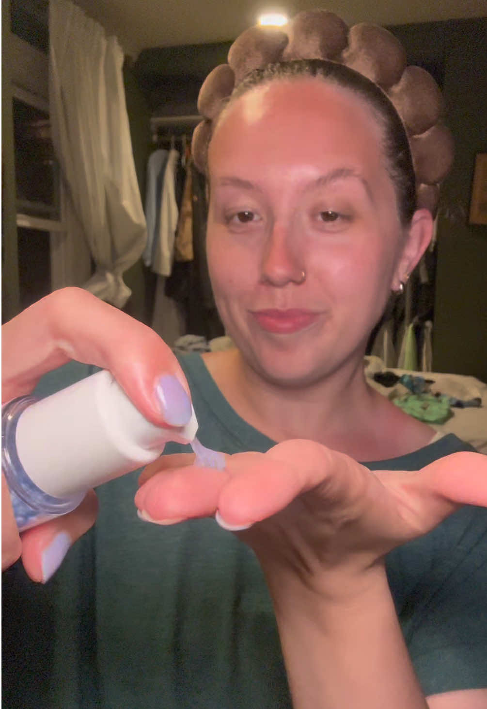 TikTok post by @oliviatuggle for KAPLAN MD. Caption reads: [...] with my facial in a bottle 10/10 from....