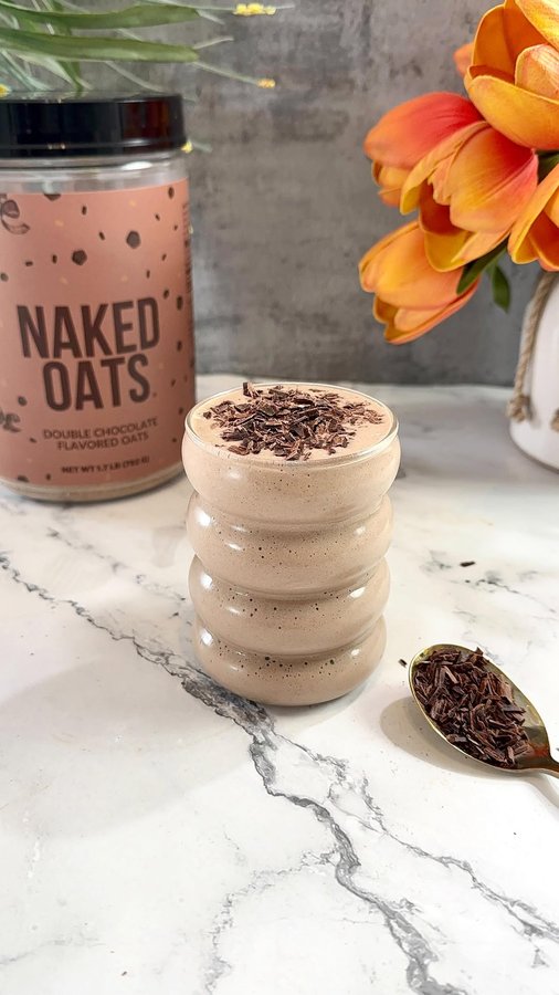 Instagram post by @lifestylebyanju for NAKED nutrition. Caption reads: [...] and chocolatey.....