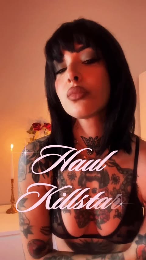 Instagram post by @andreamoonace for KILLSTAR. Caption reads: I received this dress, this amaaaaaazong belt and....