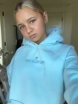 TikTok post by @perrileroyspam for Pink Palm Puff. Caption reads: Cutest hoodie ever @PINK PALM PUFF thank you so....