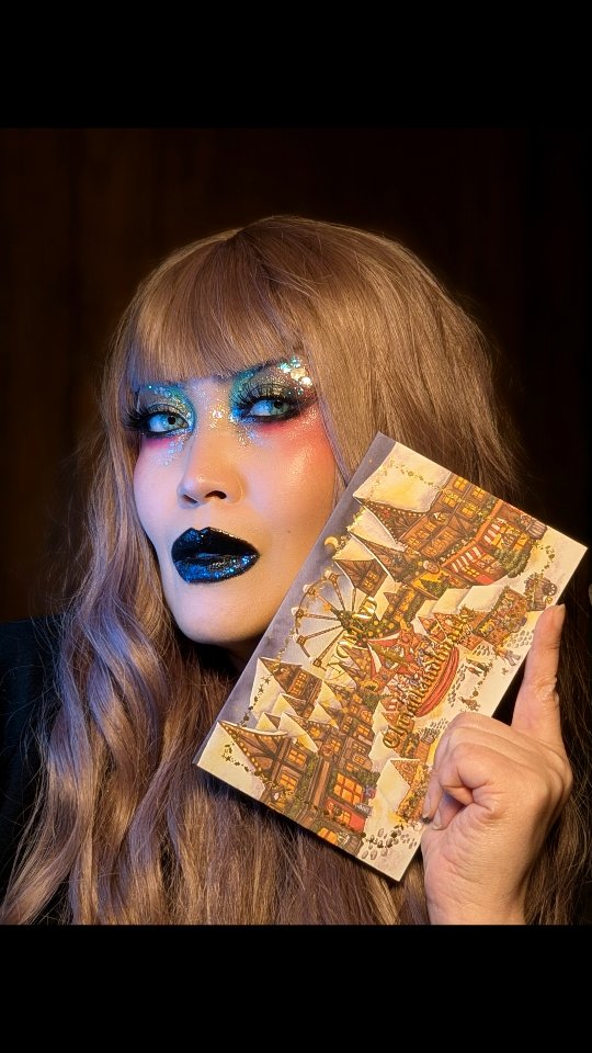 Instagram post by @lea_evangelista for Nomad Cosmetics. Caption reads: What colors do you associate with the holidays?....