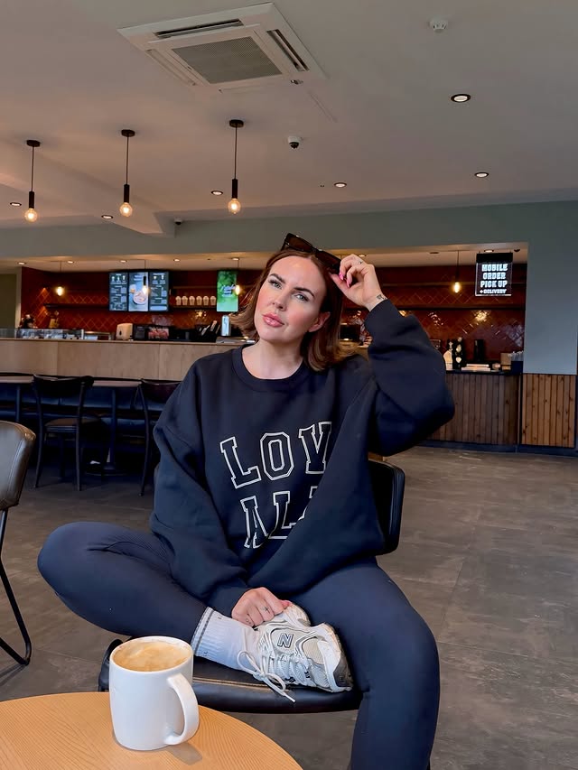 Instagram post by @mrsleonieholland for LOVALL. Caption reads: Slow Sundays in @lovallofficial 💙☕️ Lovall have a....