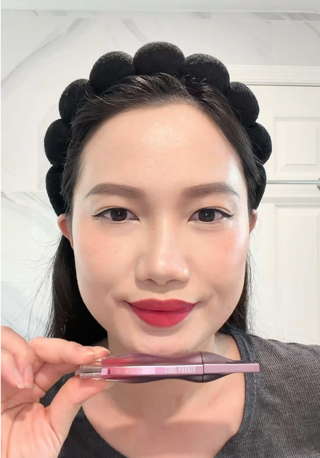 TikTok post by @mitipuu for Timephoria Store. Caption reads: @Timephoria US Store #lipcream #makeup #beauty....