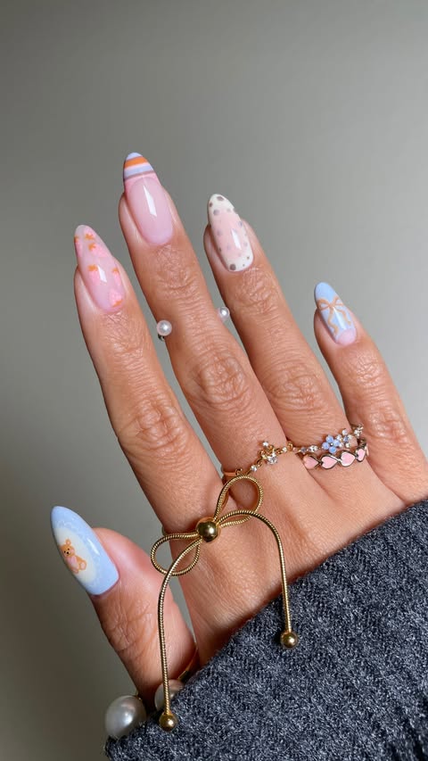 Instagram post by @sansungnails for Beetles Gel Polish. Caption reads: Pastel Coquette Nails ft. @beetlesgelpolish x....