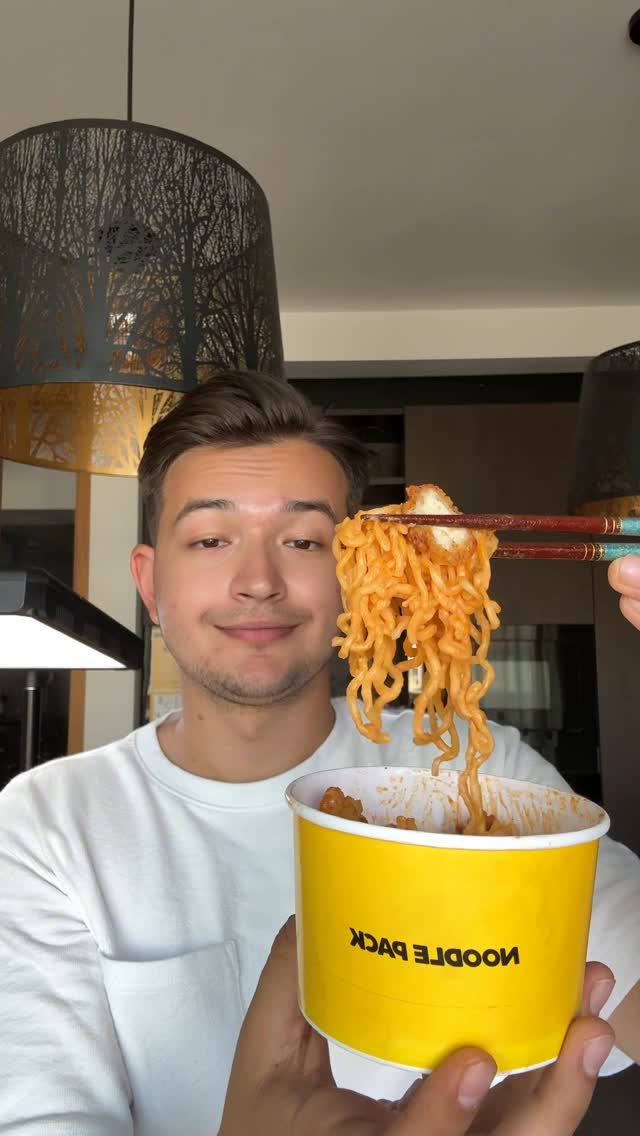 Instagram post by @dan_has_the_munchies for Wolt. Caption reads: Ai incercat vreodata Buldak Ramen? Dar Cheesy....