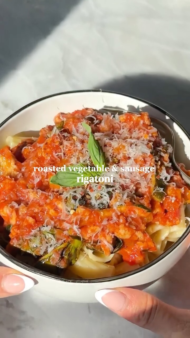 Instagram post by @healthienut for Bertolli. Caption reads: Cozy comfort in a bowl: This roasted veggie,....