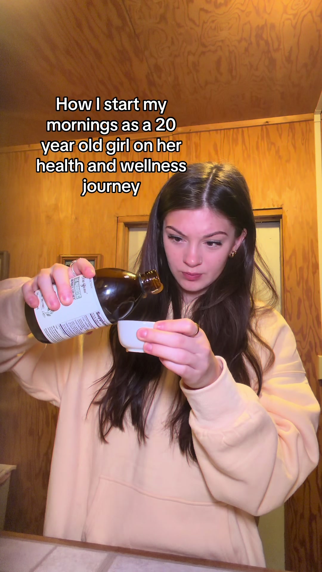 TikTok post by @kiley_burton for Triquetra Health. Caption reads: 7am wellness shots are not for the weak🤣   I am....