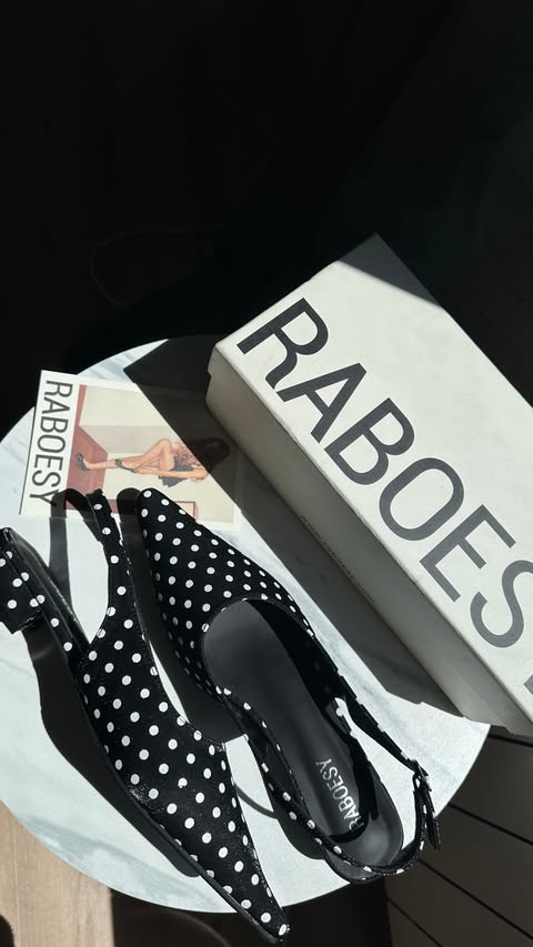 Instagram post by @mariam_gamez_ for Raboesy. Caption reads: [...] these satin polka dot slingbacks from....